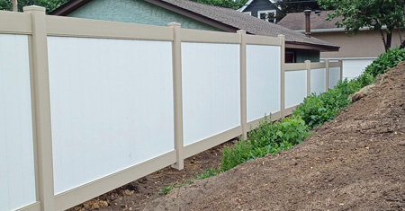 Tan and White Vinyl Combination Fence